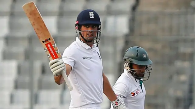 Alastair Cook celebrates his 50