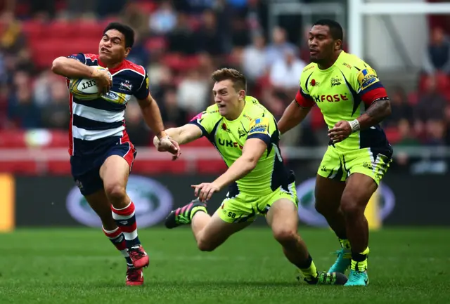 David Lemi of Bristol avoids a tackle from Mike Haley