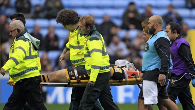 Wasps' Marty Moore leaves the pitch after sustaining an injury