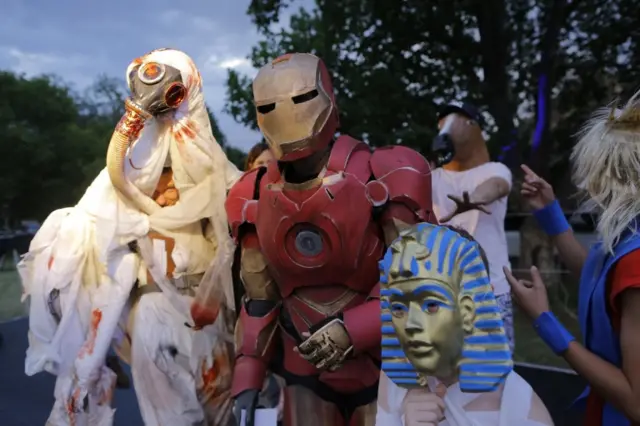 Competitors wear their Halloween costumes during the annual Halloween festival at the George Hay Park in Johannesburg, South Africa, 31 October 2016.