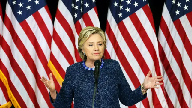 Hillary Clinton speaks to reporters following a campaign rally at Roosevelt High School in Des Moines, Iowa - 28 October 2016