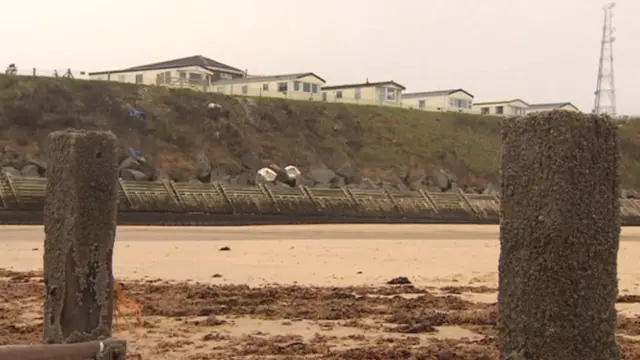 A view of sea defences at Castaways Holiday Park from Bacton beach