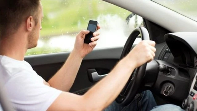 Motorist with phone