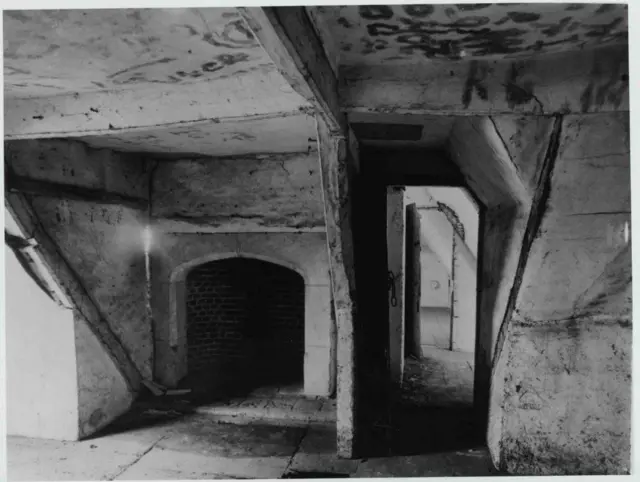 Deliberate candle marks on the attic ceiling