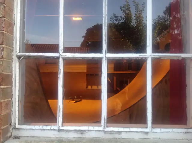 Looking through the window into the house