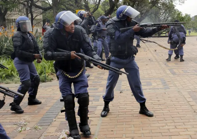 Police forces shoot at Wits students during running battles on the campus as ongoing protests continue against the cost of higher education in Johannesburg, South Africa, 04 October 2016