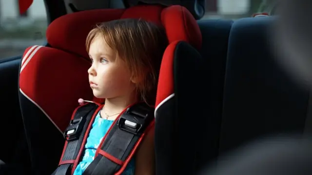 Child with seat belt