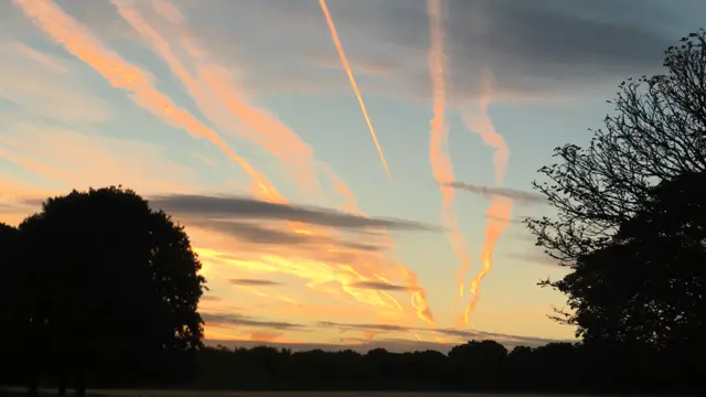 Vapour trails over South West London