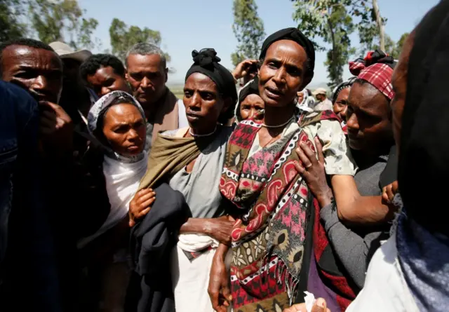 A woman mourns during the funeral of Tesfu Tadese Biru, 32, a construction engineer who died during a stampede after police fired warning shots at an anti-government protest in Bishoftu during Irreecha, the thanksgiving festival of the Oromo people, in Denkaka Kebele, Ethiopia, October 3, 2016