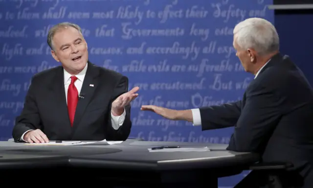 Tim Kaine (L) and Mike Pence