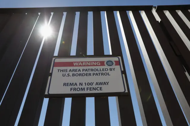 A US-Mexico border fence in California