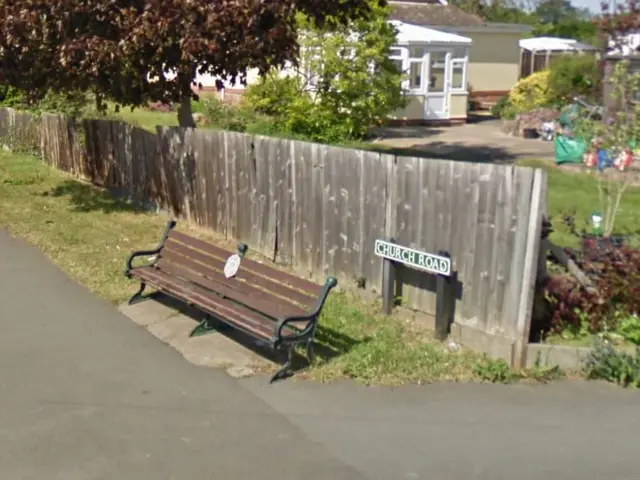 The memorial bench to Norman Caswell Sayer