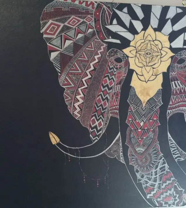 Art work in red, black, white and gold