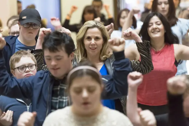 Sally Phillips, presenter of the BBC Two programme, with a flashmob including people with Down's syndrome