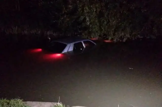 Car in canal