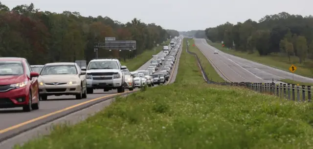 Bumper-to-bumper traffic heads out on the SR528 in Florida