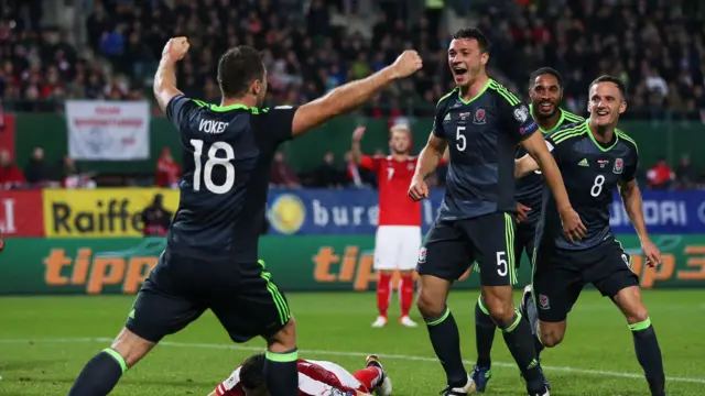 James Chester of Wales celebrates his sides second goal which was an own goal by Kevin Wimmer