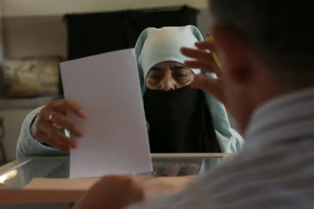 Woman voting in Morocco