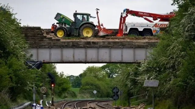 Tractor on bridge