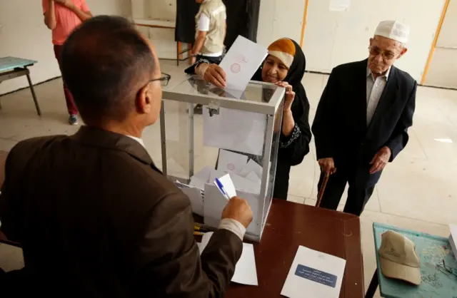 Woman voting in Morocco