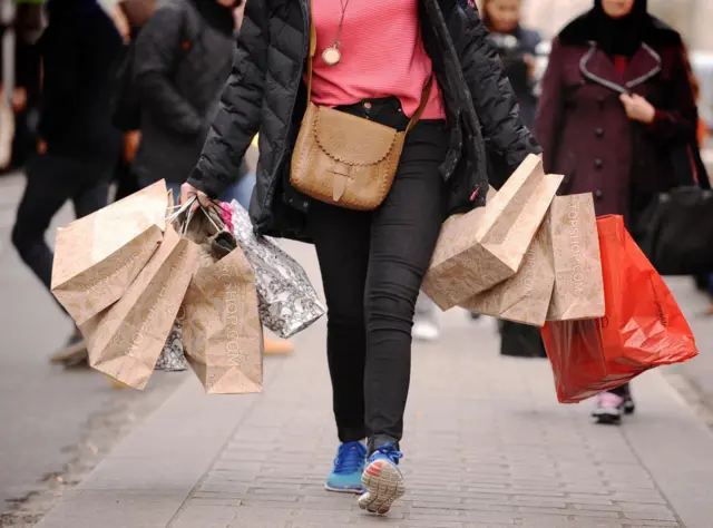 Shopper loaded with bags