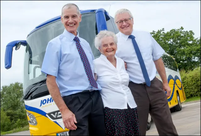 Joan Johnson with sons John and Peter