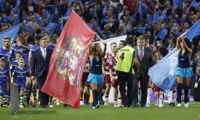 Players come out pre-match