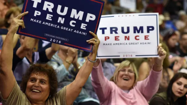 Supporters cheer for Republican presidential candidate Donald Trump during a campaign rally in Arizona - 5 October 2016