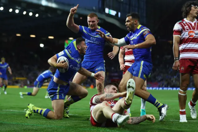 Warrington celebrate opening try