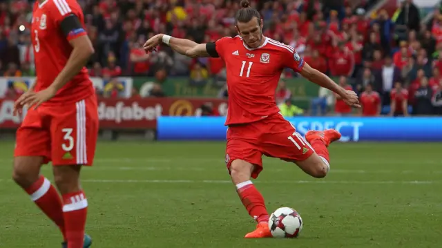 Gareth Bale takes a free-kick