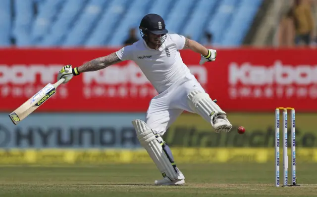 Ben Stokes kicks the ball past the stumps