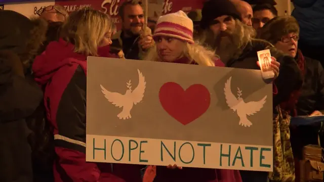 Hope not hate poster at vigil