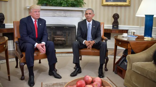 President Barack Obama meets with President-elect Donald Trump to update him on transition planning in the Oval Office at the White House on November 10, 2016