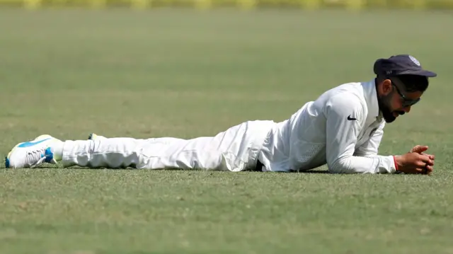 Virat Kohli reacts after missing a chance