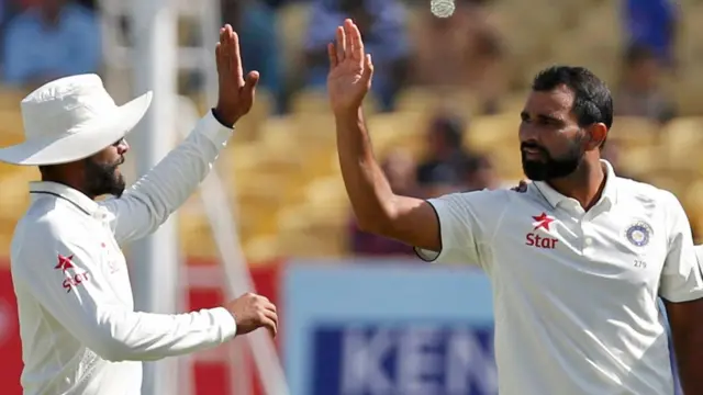 India's players celebrate the wicket of Jonny Bairstow