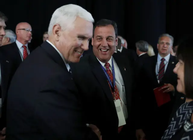 Republican vice presidential nominee Governor Mike Pence (L) greets New Jersey Governor Chris Christie.