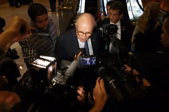 Giuliani making some extremely brief remarks to the press