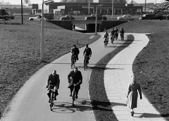 A black and white photo of cyclists in Stevenage in the early fifties.