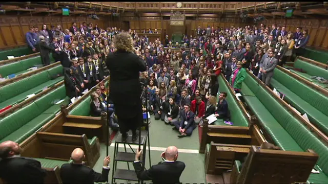 members of youth parliament pose for a photo in the house of commons