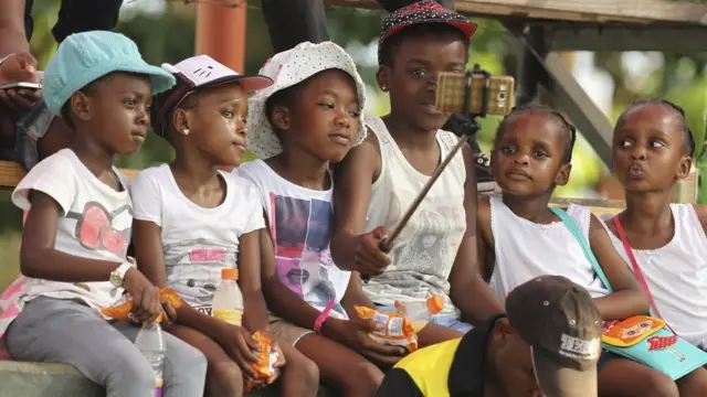 Children taking a selfie at the Harare Sports Club in Harare, Zimbabwe - Sunday 6 November 2016