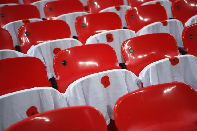 Wembley seats with poppy t-shirts on them