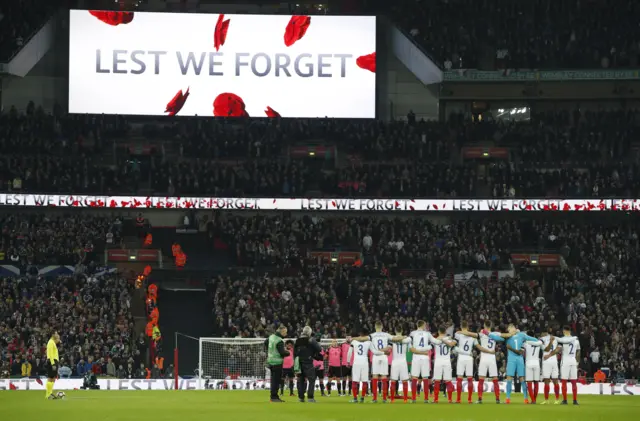 The players observe a minutes silence