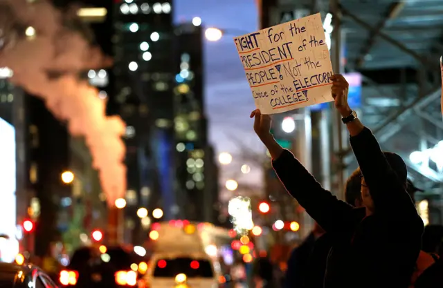 protester outside Trump tower