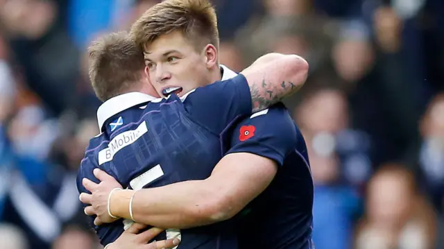 Huw Jones celebrates