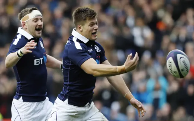 Huw Jones celebrates