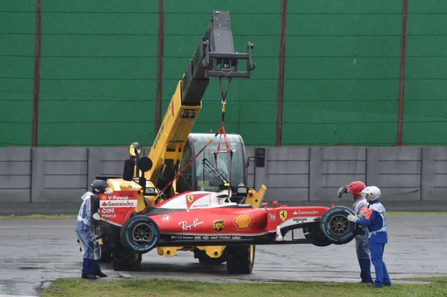 Kimi Raikkonen is removed from the track