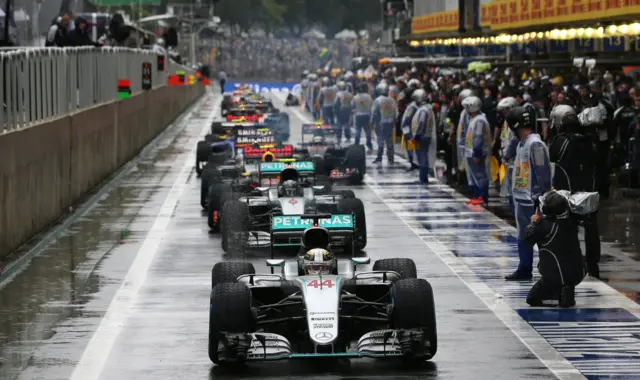 Cars in the pit lane