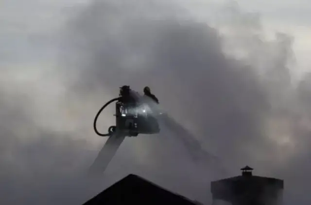 Fire crews tackle a blaze in Gas Works Lane, Elland.