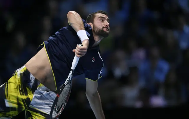 Marin Cilic serves