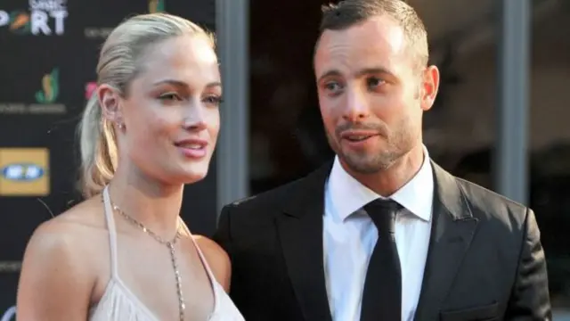 Reeva Steenkamp (L) and Oscar Pistorius (R) pictured together